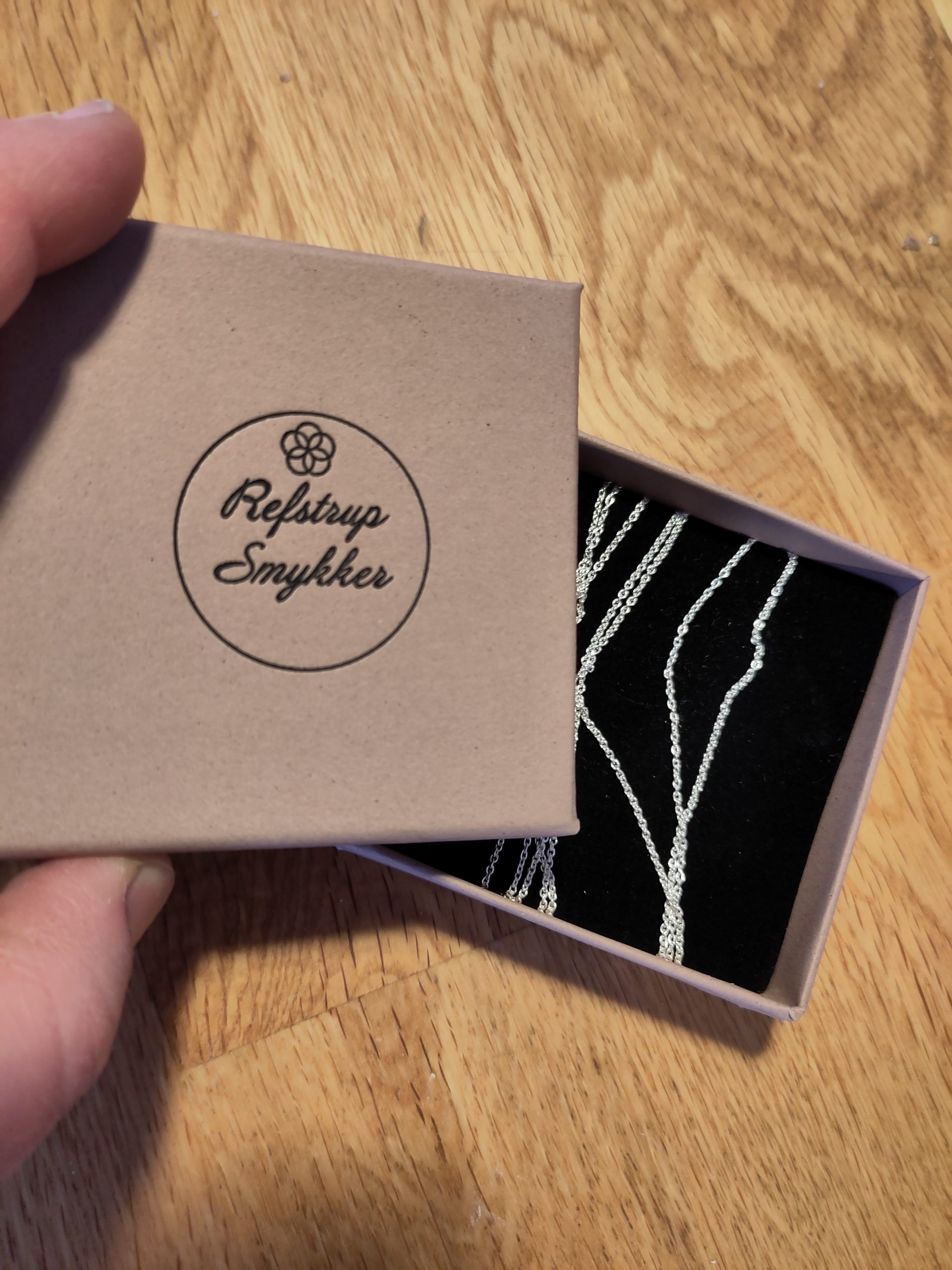 Kæde af sølv eller guld